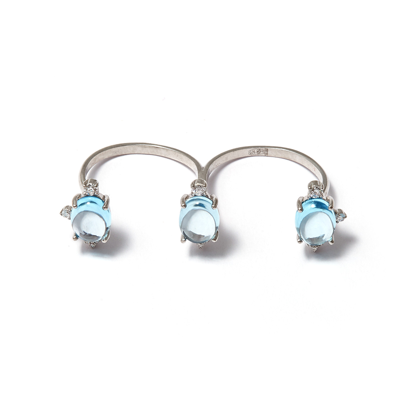 Silver two-finger ring with blue topaz