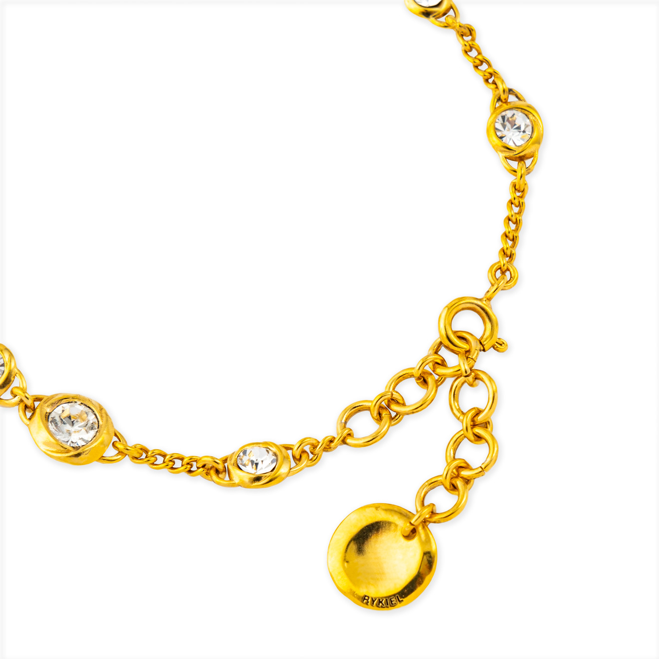 SONIA RYKIEL Золотистый браслет с белыми кристаллами lisa smith золотистый открытый браслет с античным мужским ликом