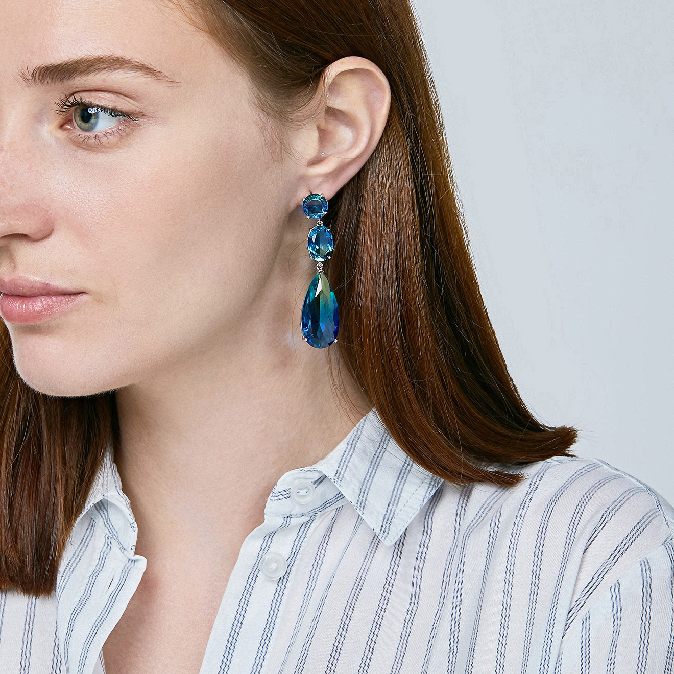 chandelerearrings with blue-green crystals
