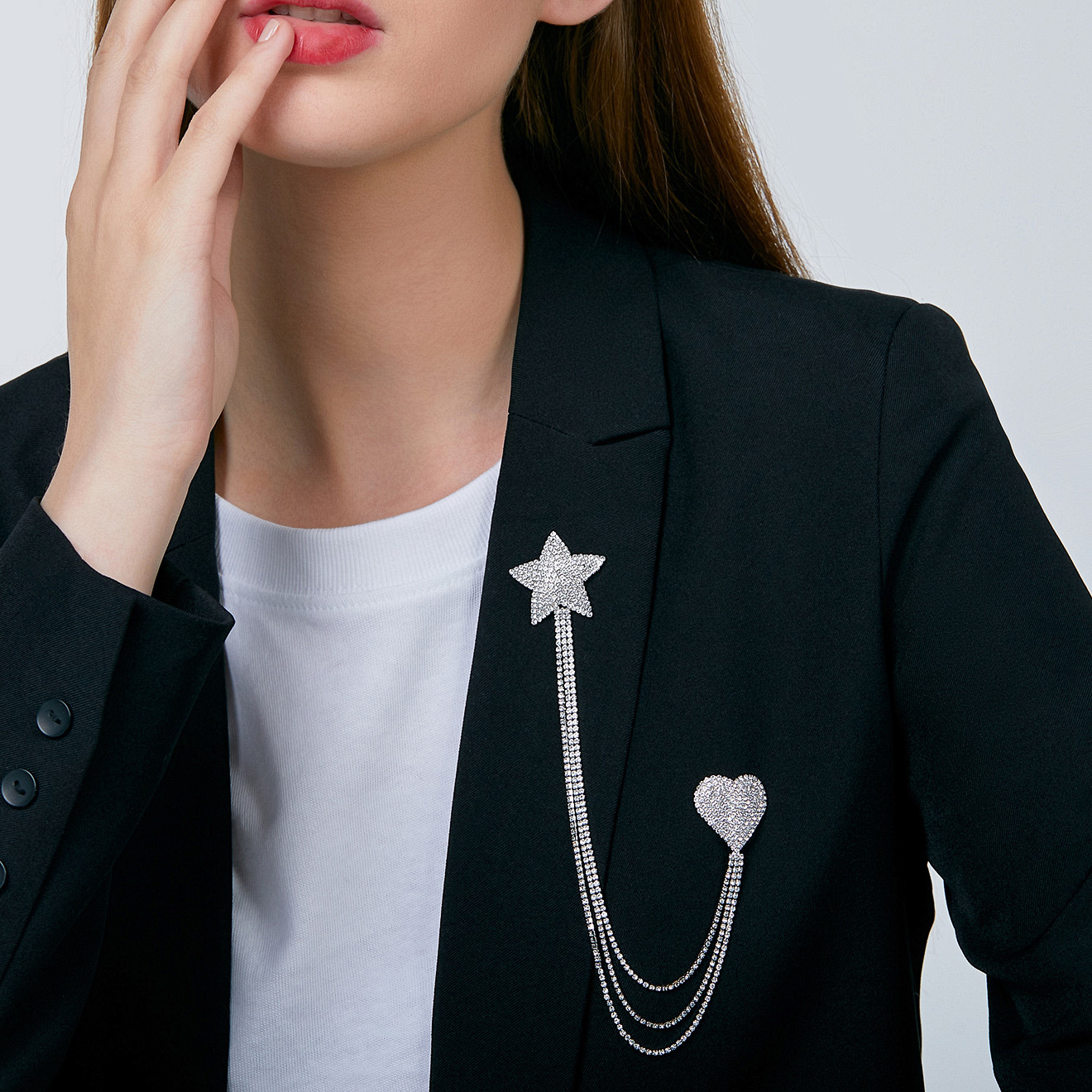Double  brooch with a star and a heart