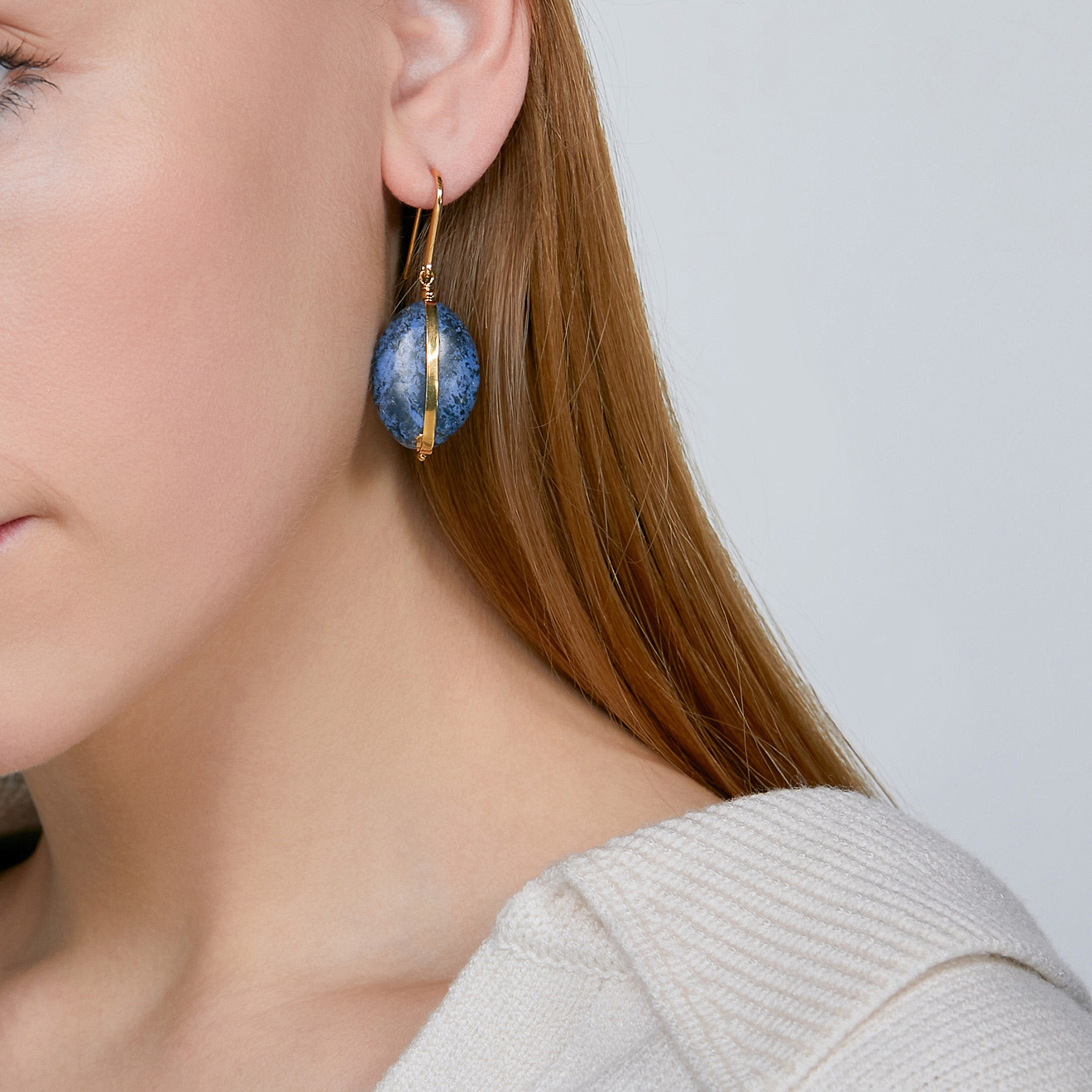 earrings with blue stone pendants