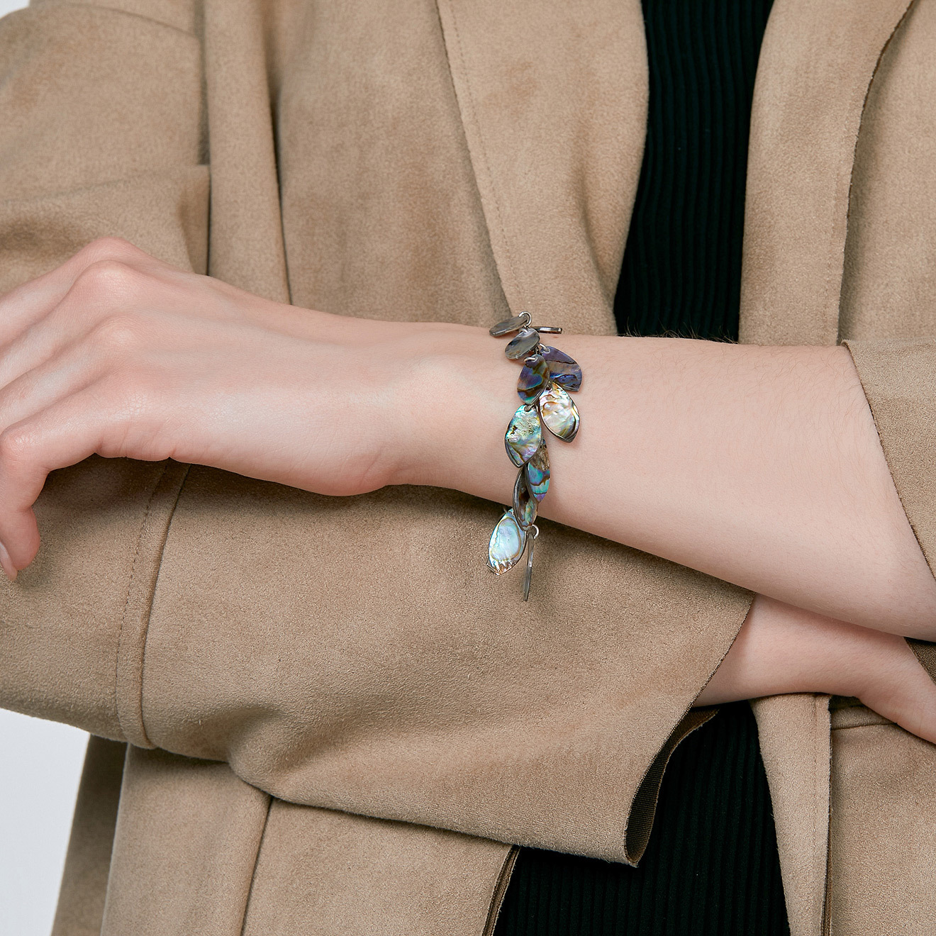 Silver bracelet with pearl pendants