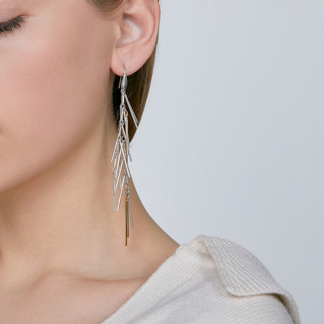 Cascade earrings with gold and silver pendants