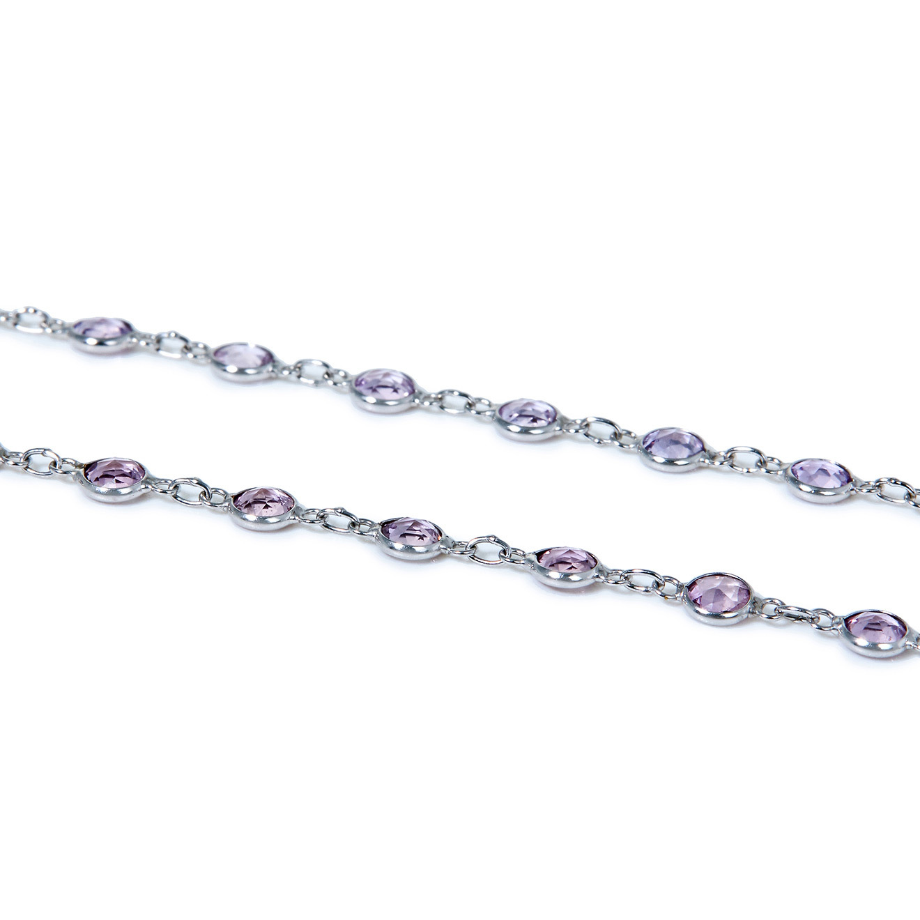 White gold sautoire with pink sapphires