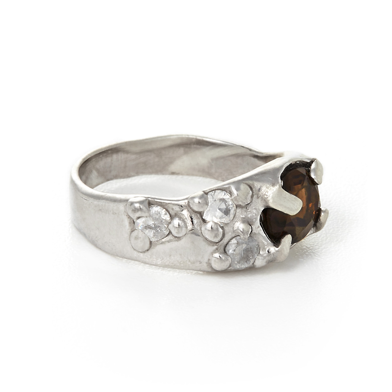 Ring with a large rauch topaz