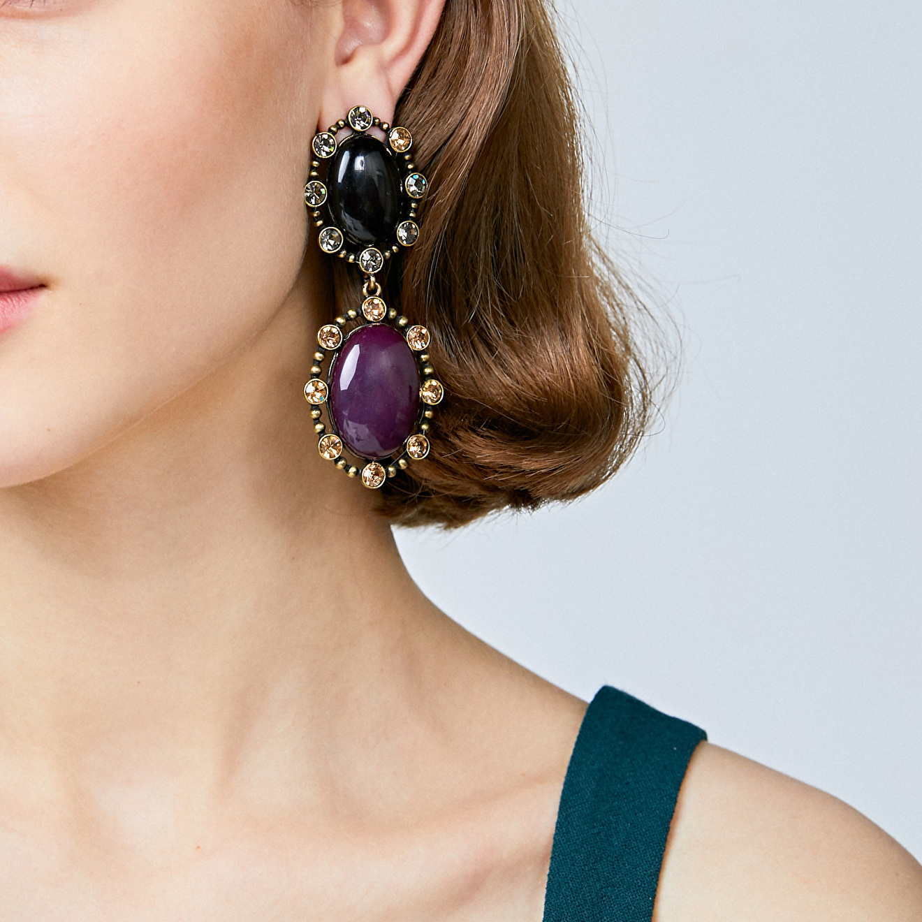Double earrings with purple and black stones