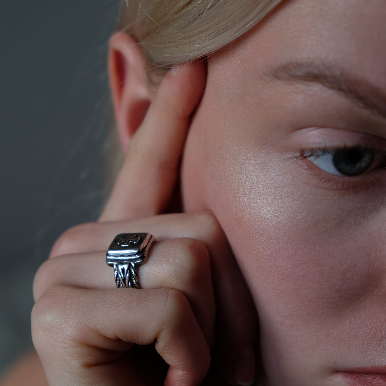 Silver ring with a cross