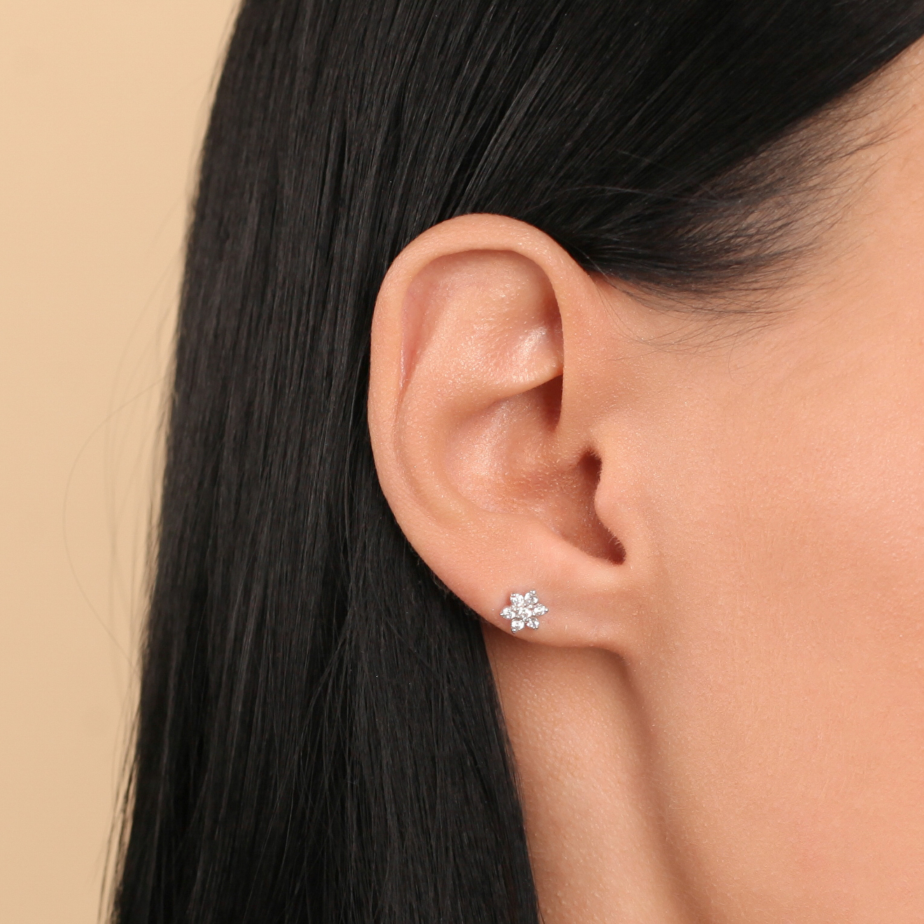 Piercing rod made of silver with a crystal flower