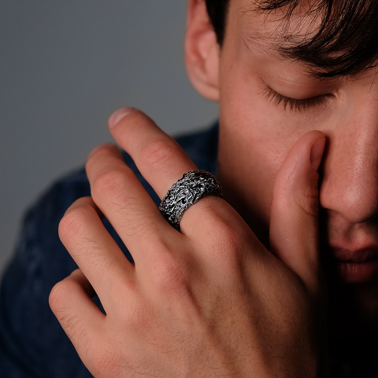 Wide silver ring with black spinel