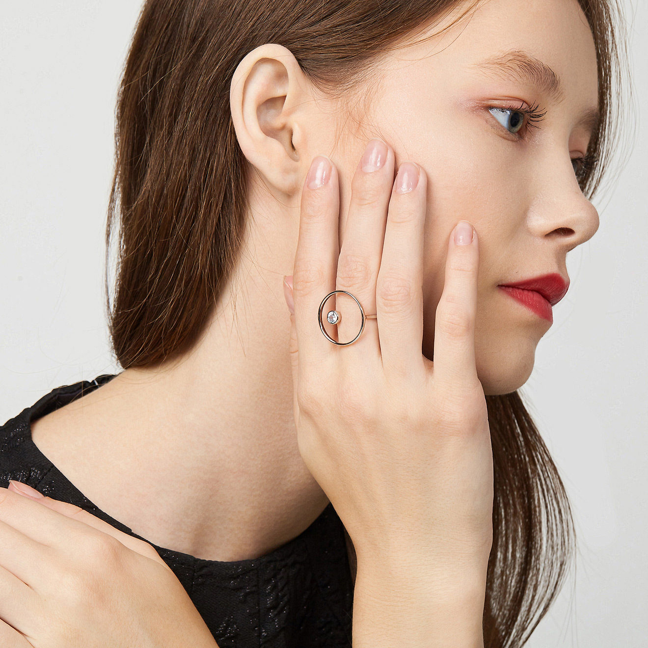 ring with circle and crystal