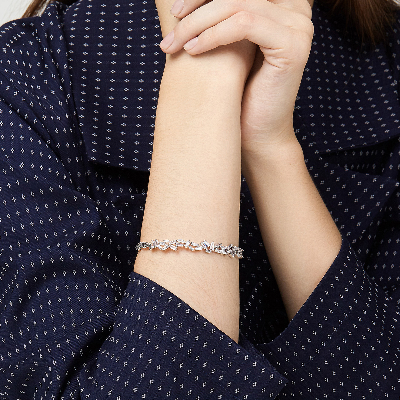 Silver open-ended bracelet with crystals