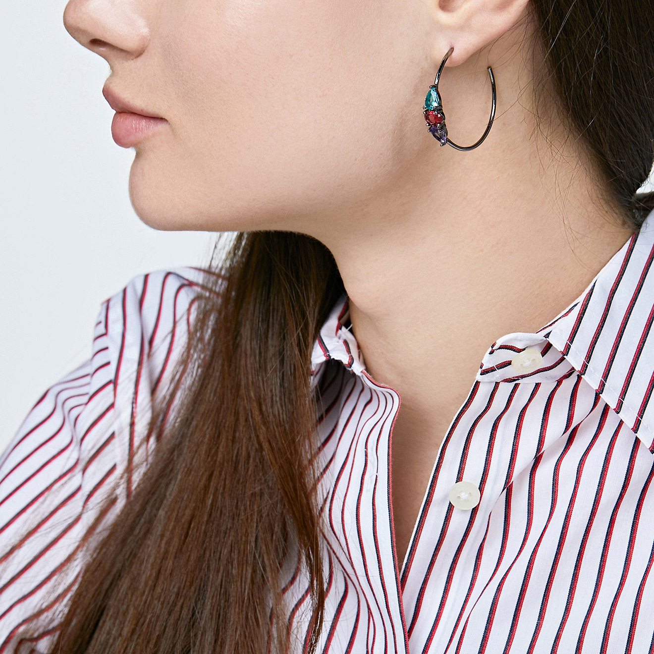 Black ring earrings with colored crystals