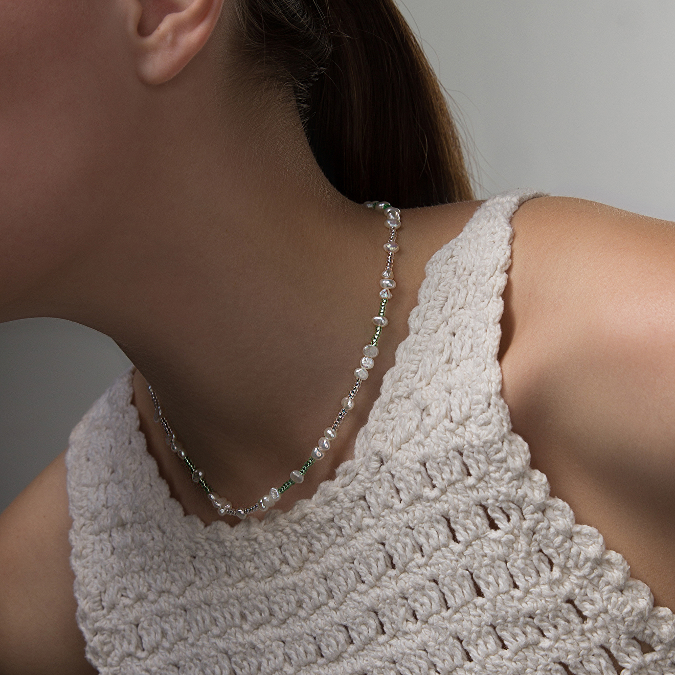 Silver-green necklace made of small pearls
