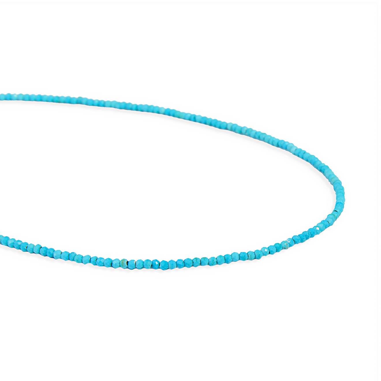 A thin thread of silver with turquoise