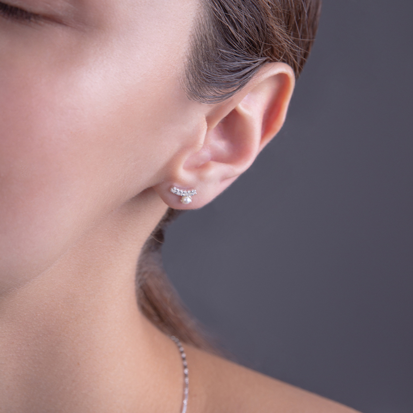 Silver poussettes with pearls and topaz