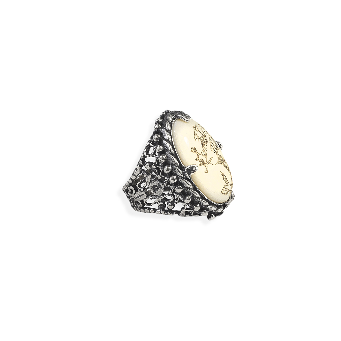 Silver ring with bone and wyvern pattern