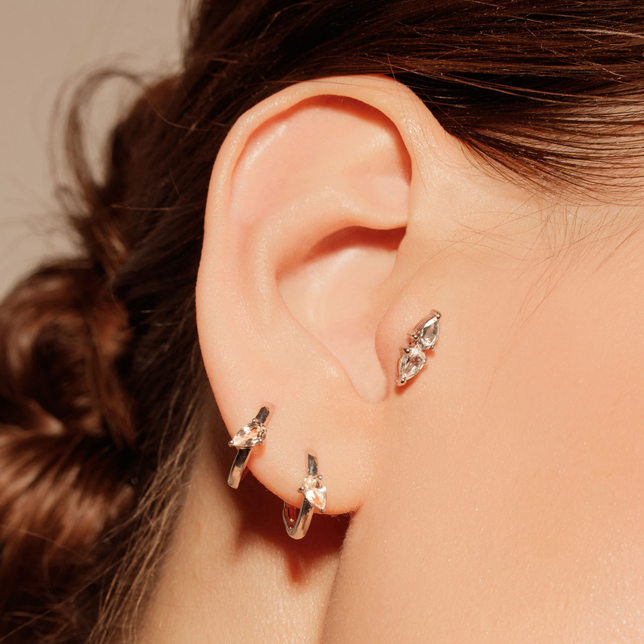 Silver clicker with zirconium, from the Piercing collection