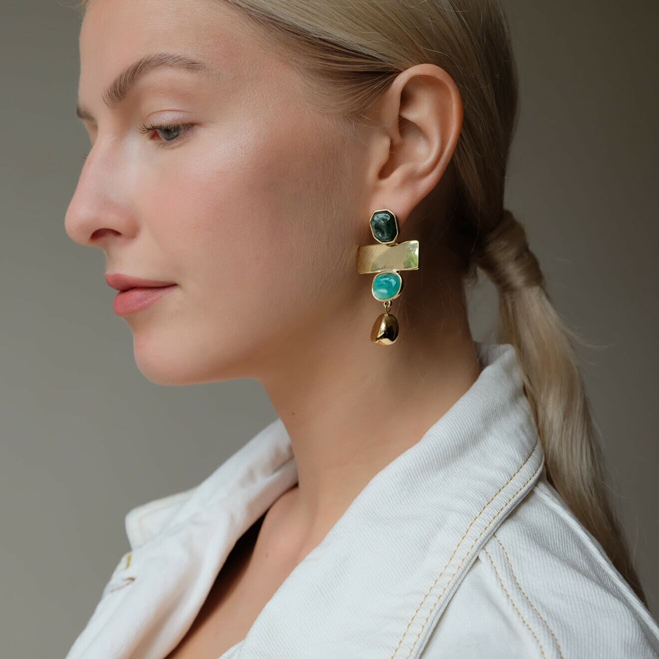 earrings with rectangular pendants and green inserts