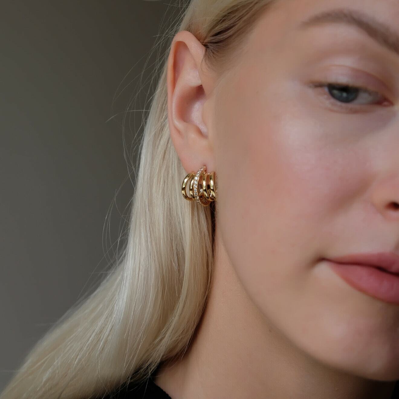 asymmetric spring-like beads with crystals