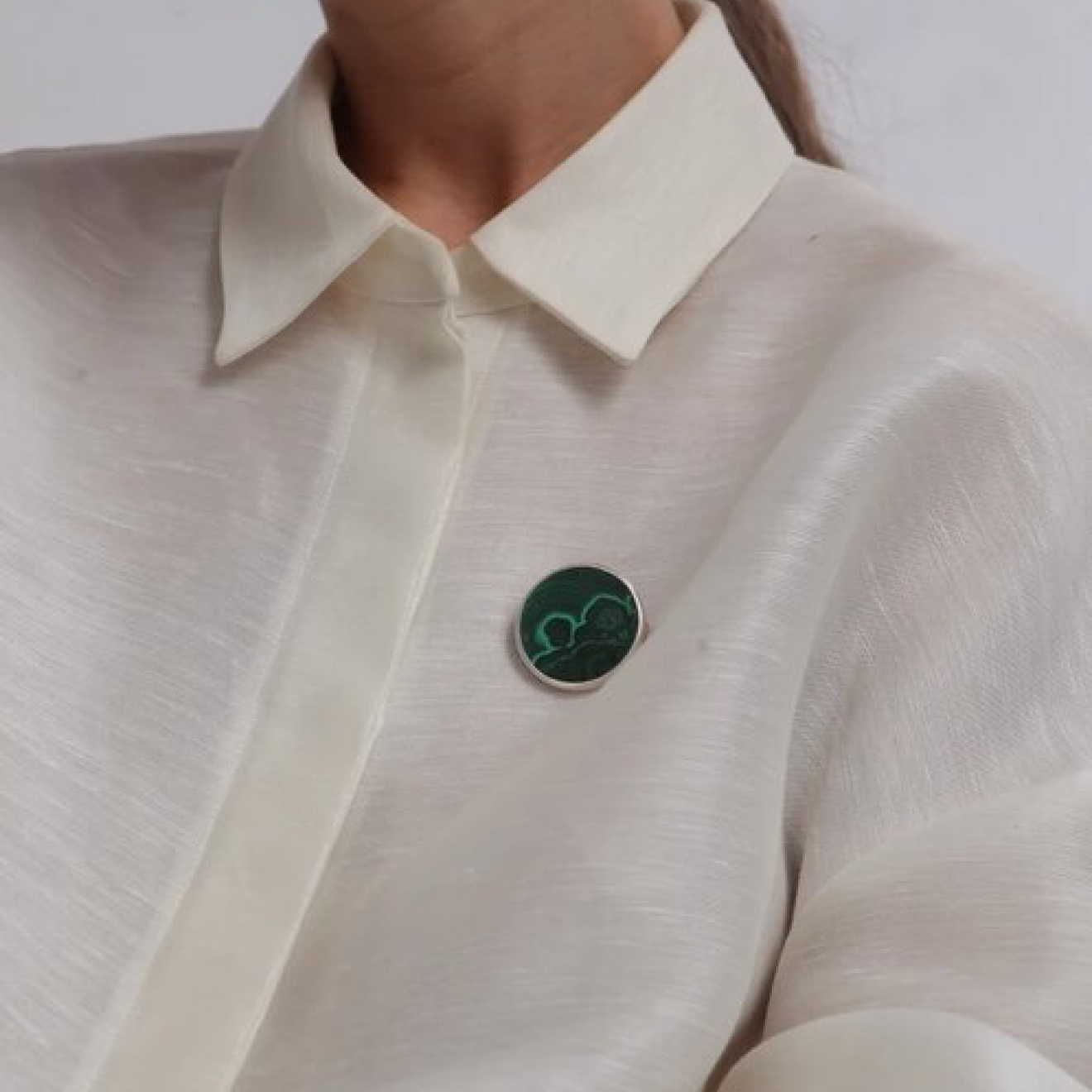 Silver brooch with malachite, from the Planets collection