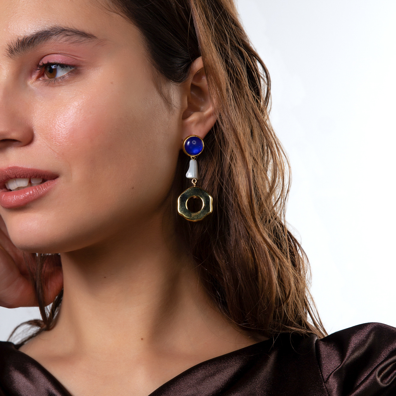 earrings with blue stone and round pendants