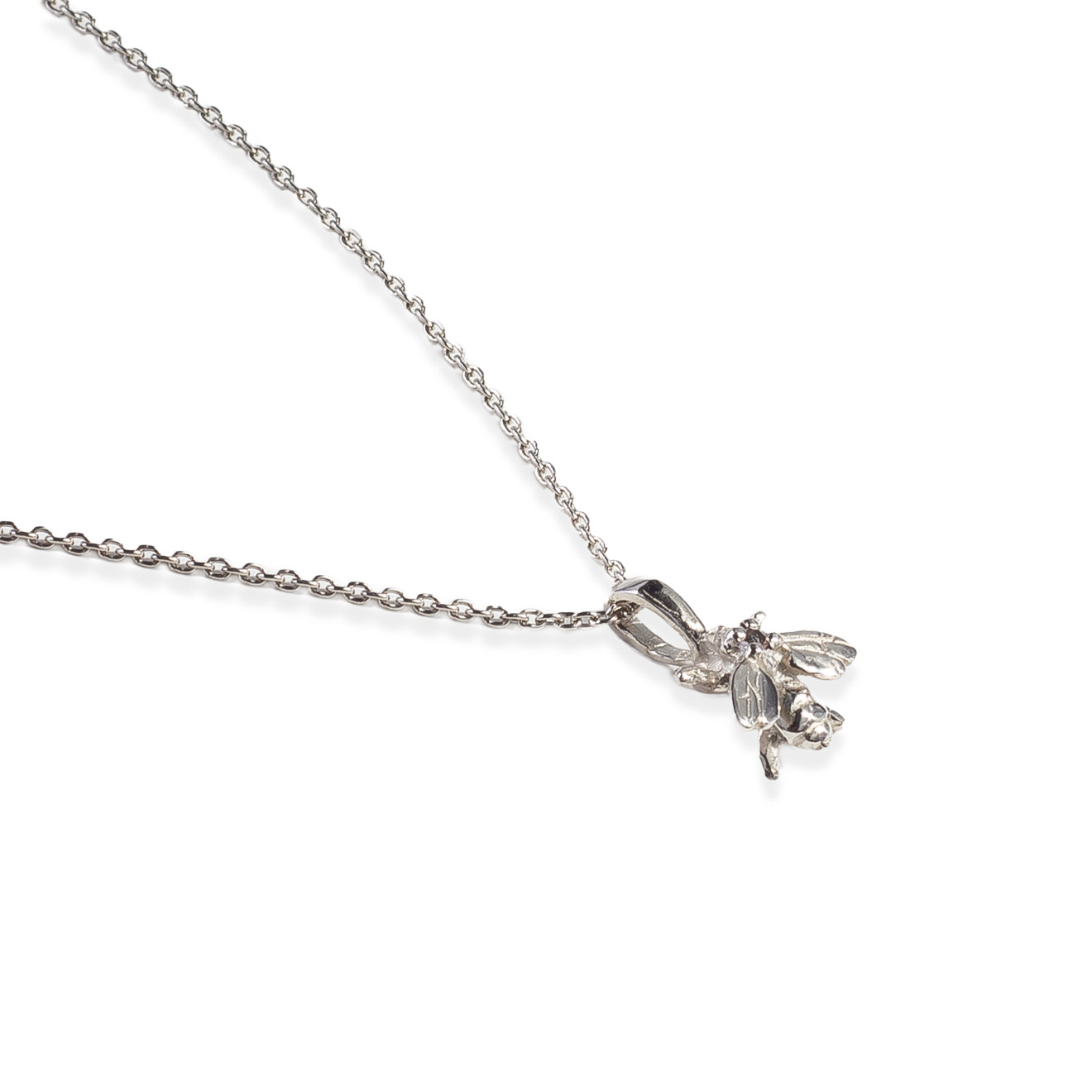 A small fly pendant with a rauchtopaz on a silver chain