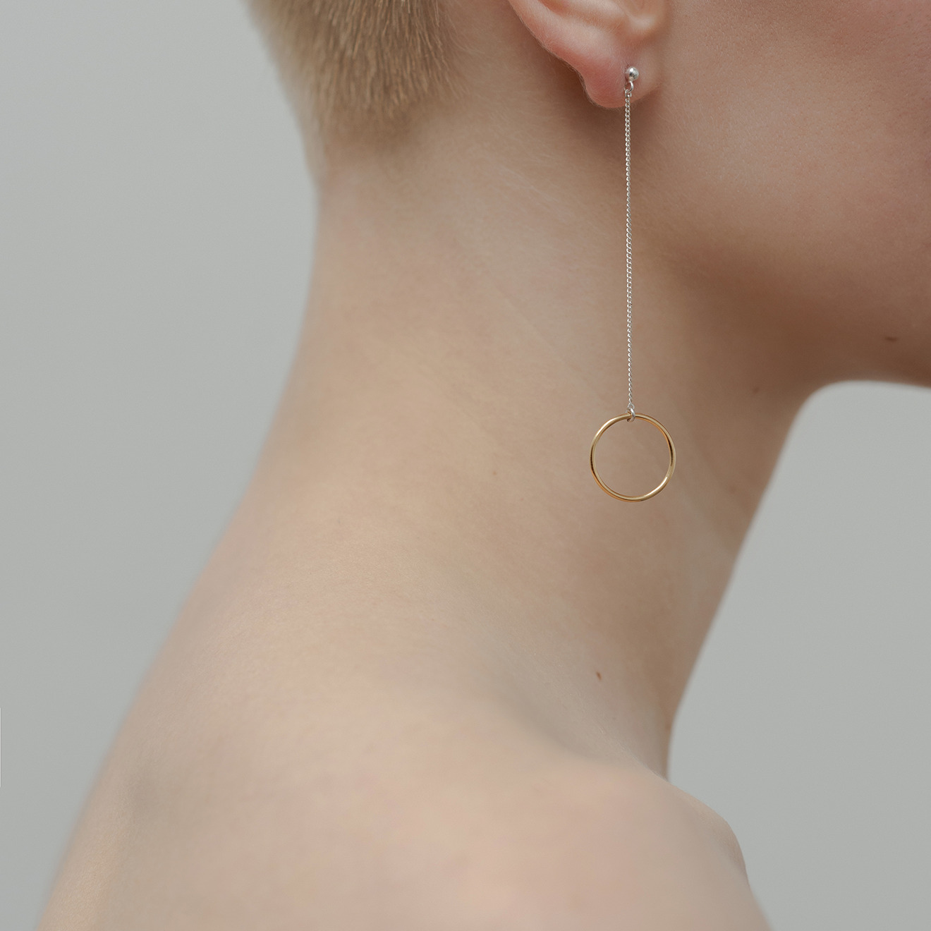 Gold-plated asymmetric earrings made of silver Karma