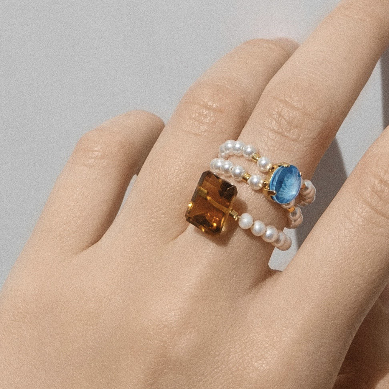 Double ring with pearls and Swarovski Uranus Aquarius crystal