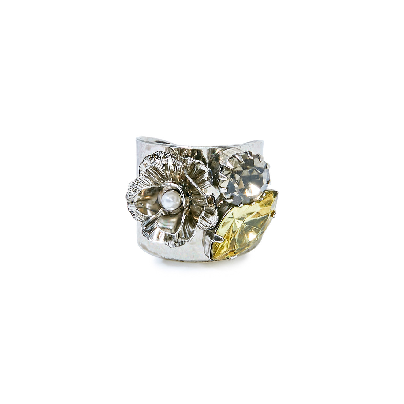 Blackened ring with flowers and crystals