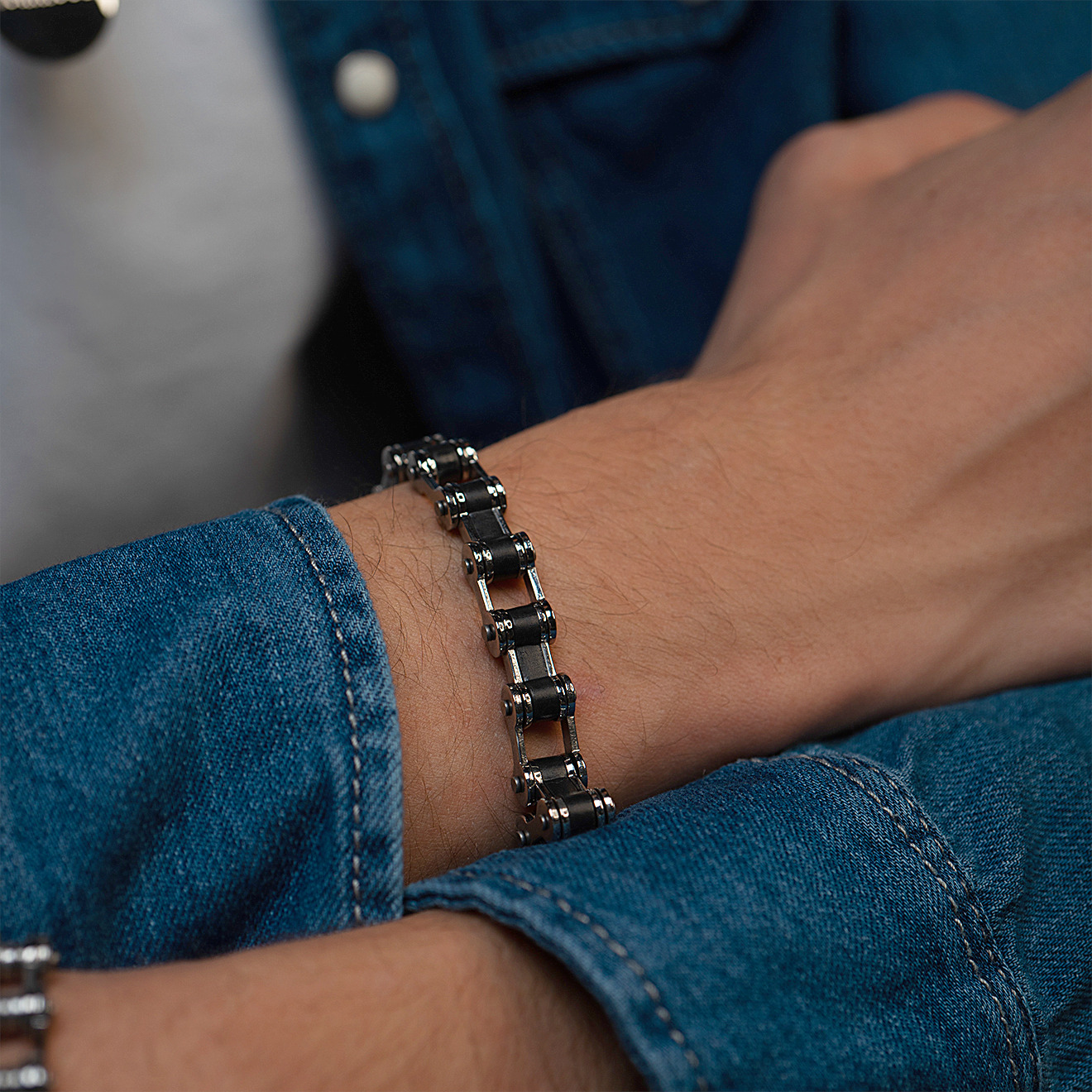Steel bracelet with black inserts