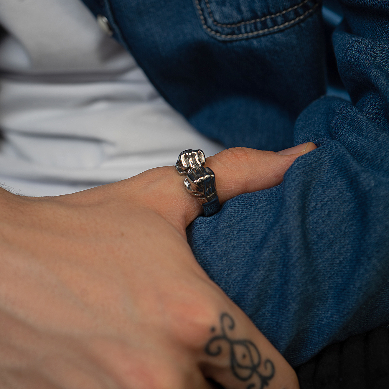 Steel ring with hands
