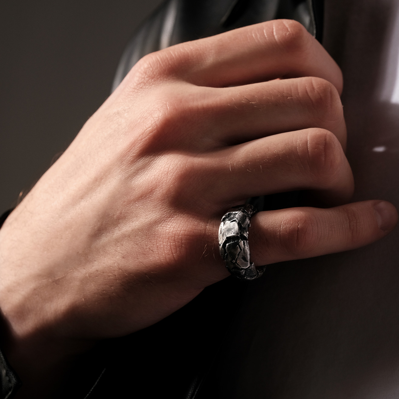 Silver ring with cracks