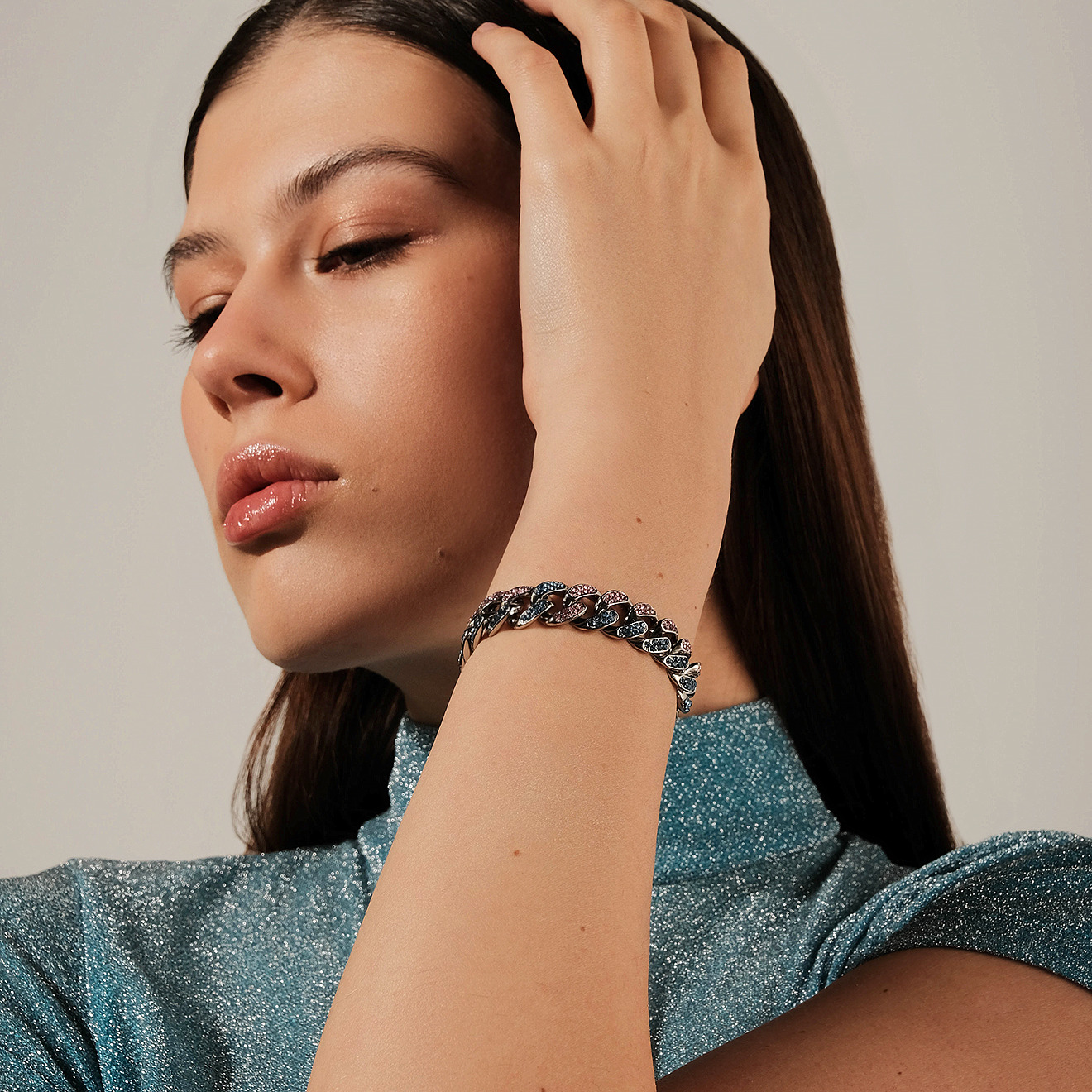 Silver chain bracelet with pink and blue crystals