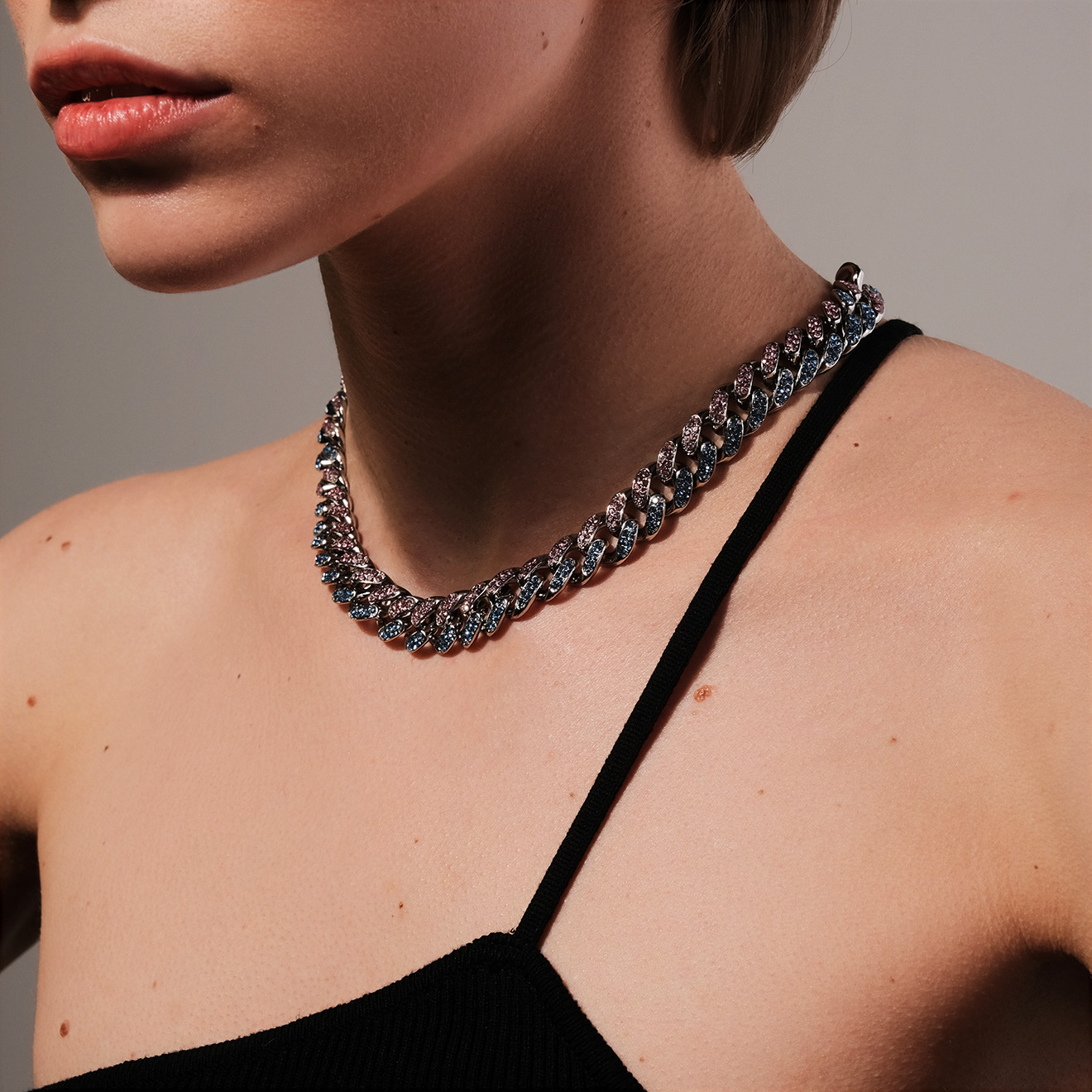 Chain necklace with blue and pink crystals