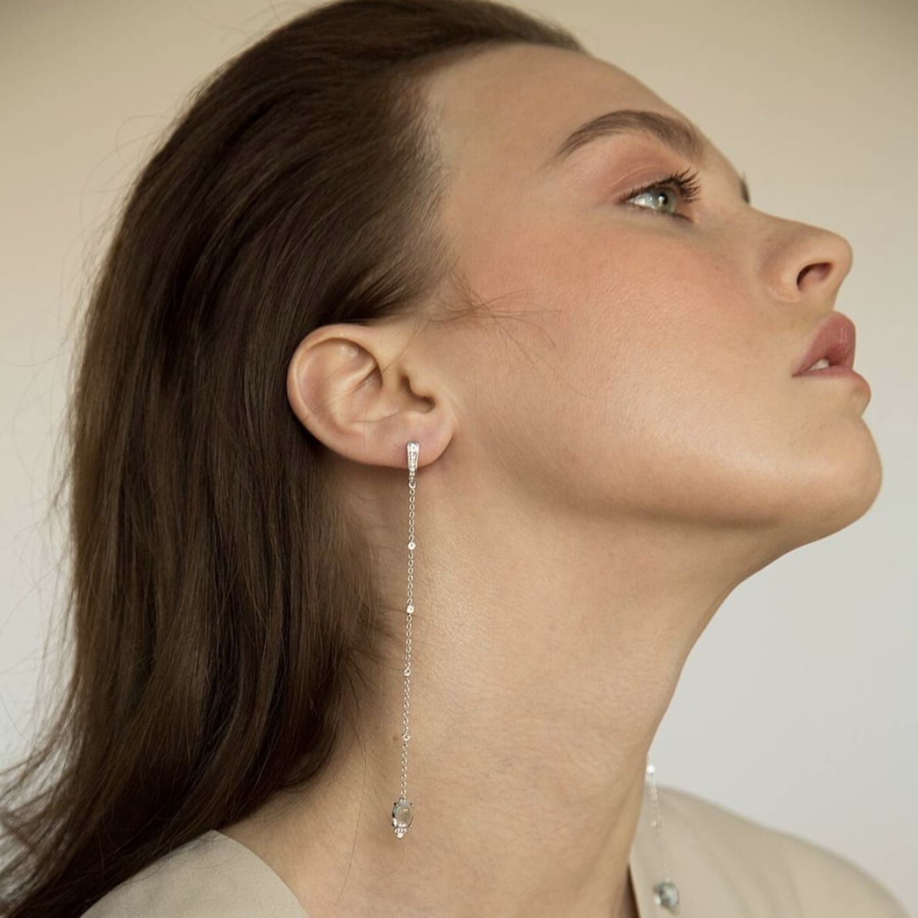 Silver chain earrings with blue topaz