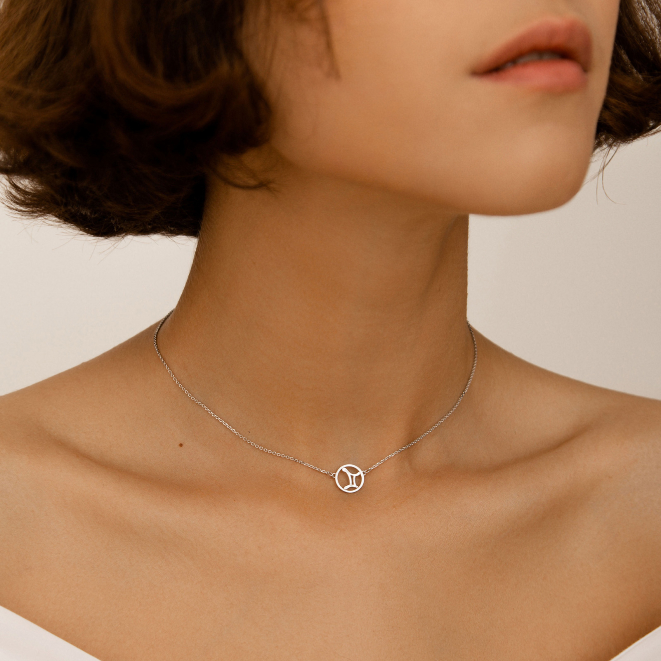 Necklace made of silver zodiac sign "Gemini"