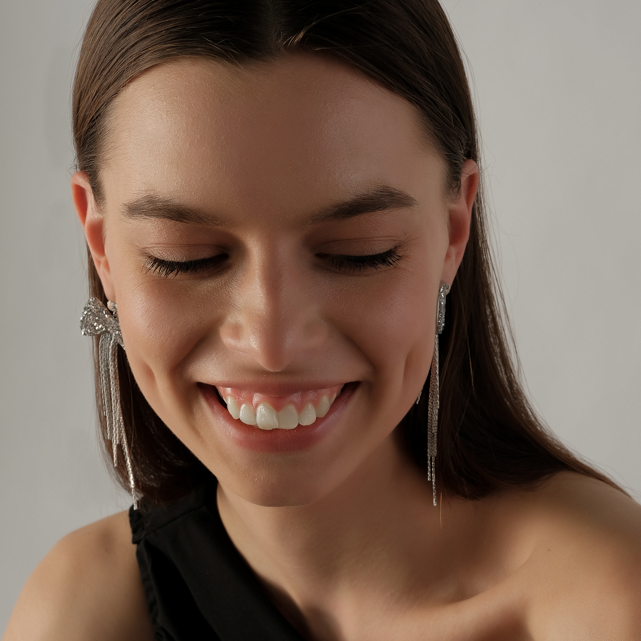 bow earrings with crystals and chains