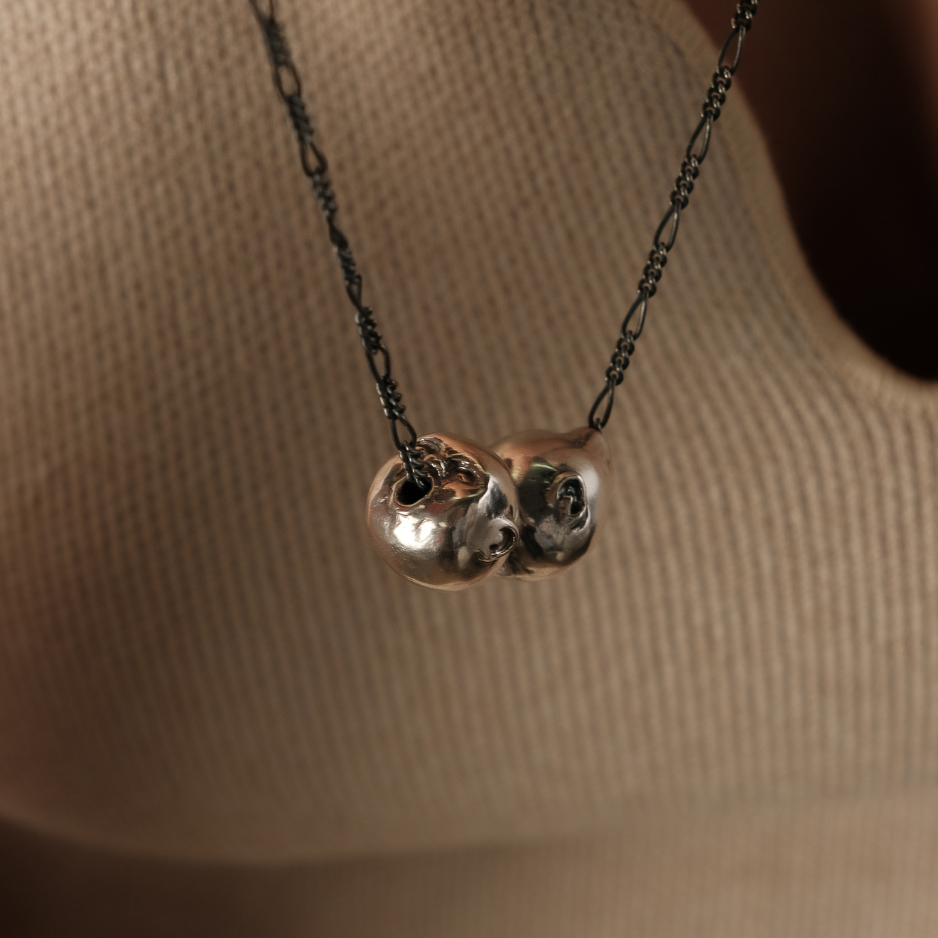Black chain with silver pendants