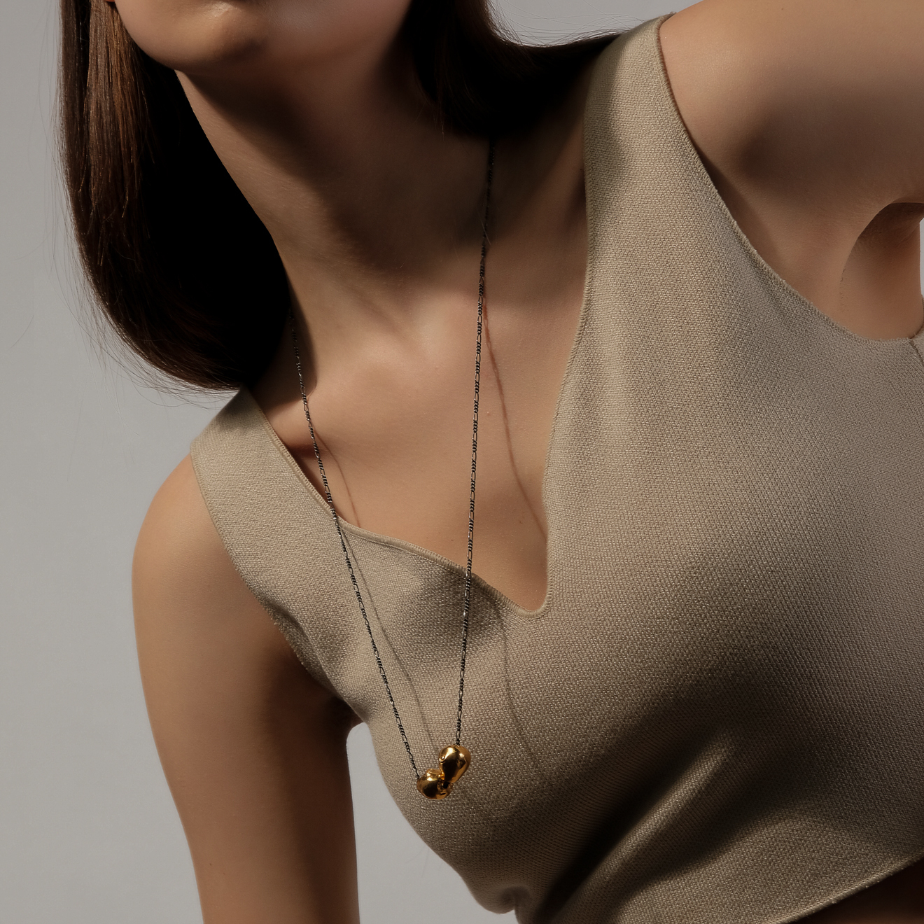 Black chain with gold-plated silver pendants