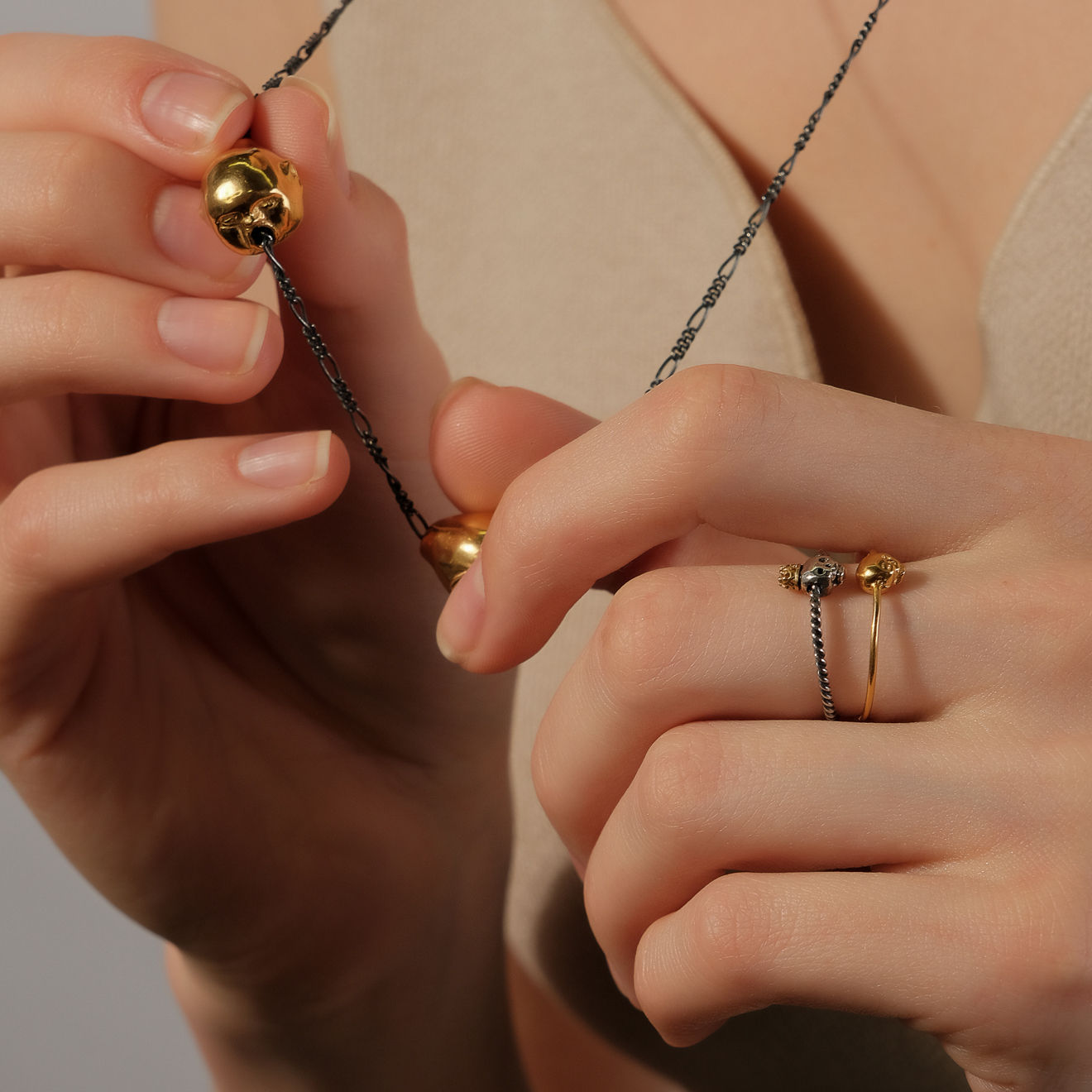 Black chain with gold-plated silver pendants