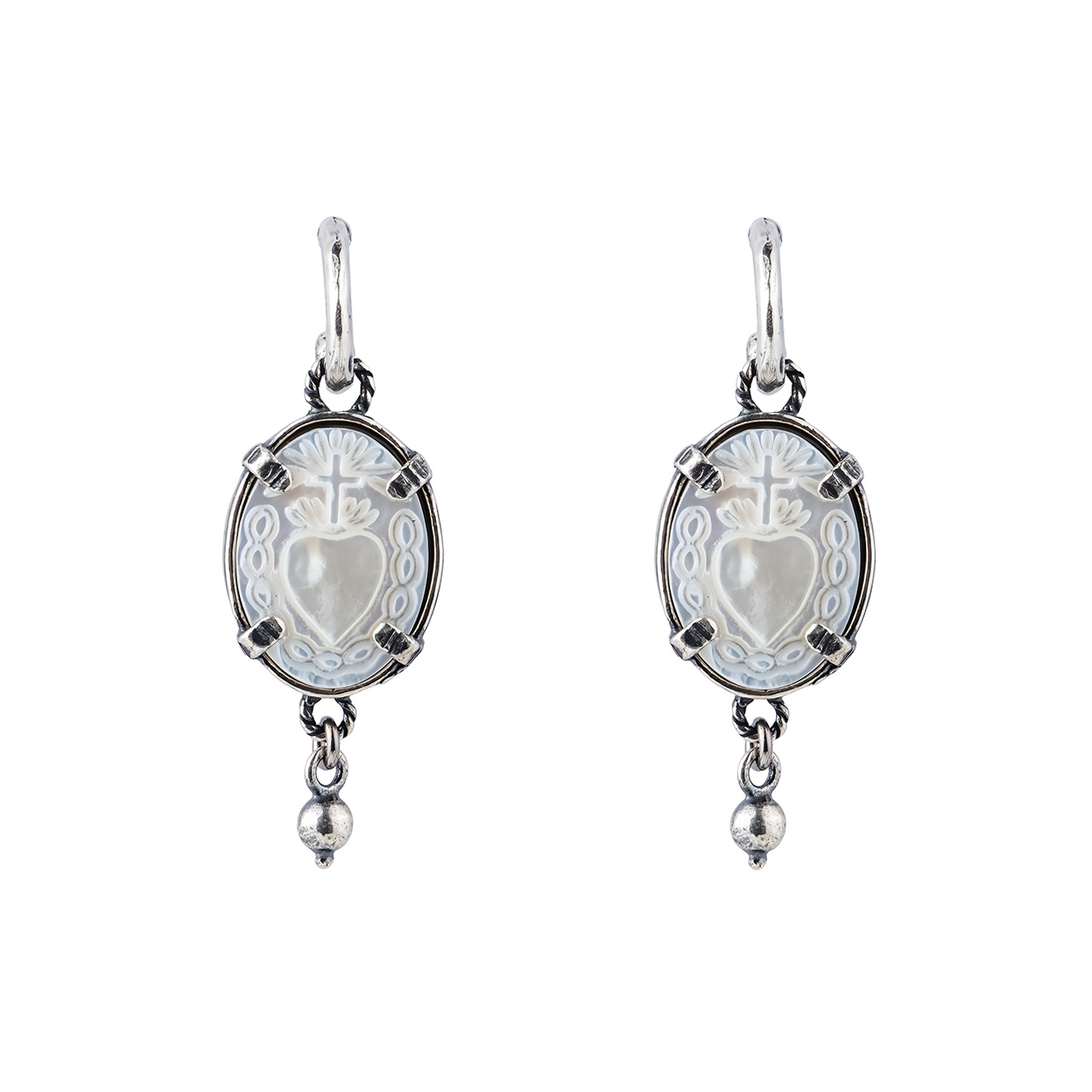 silver earrings with blue glass inserts