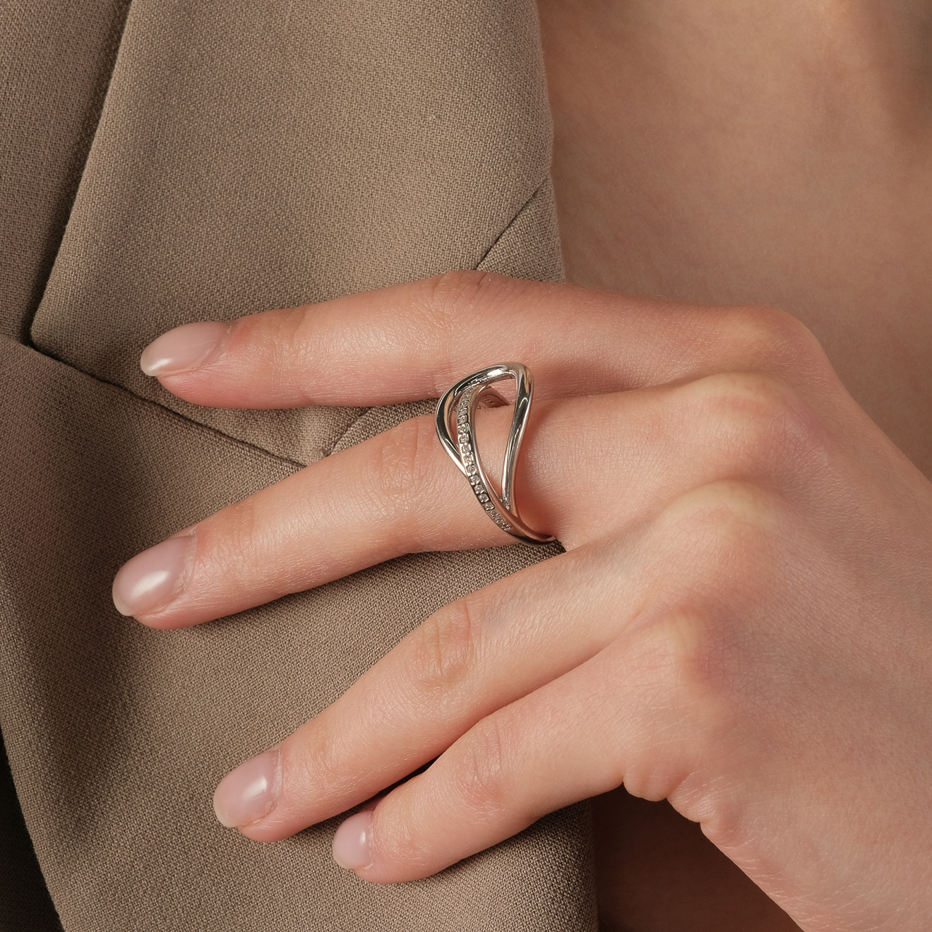 crossed ring with crystals