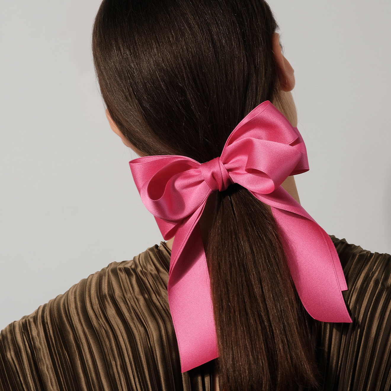 Bright pink bow hairpin