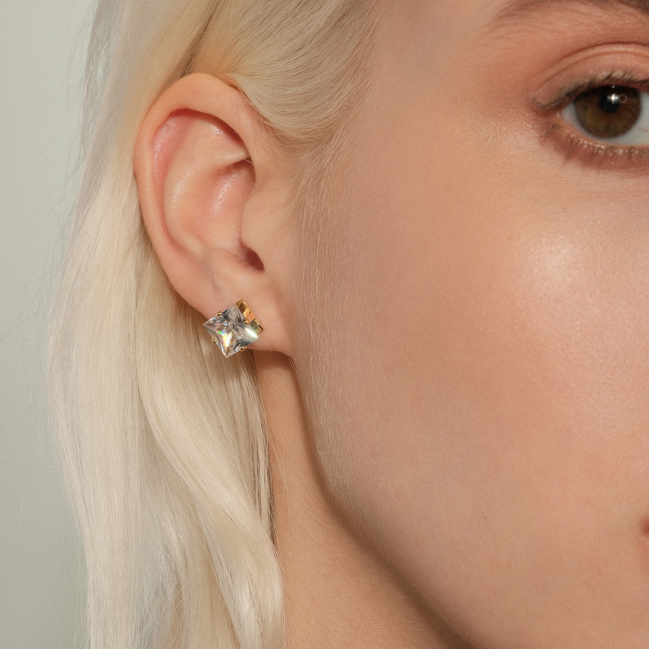 stud earrings with crystals and a cuff pendant