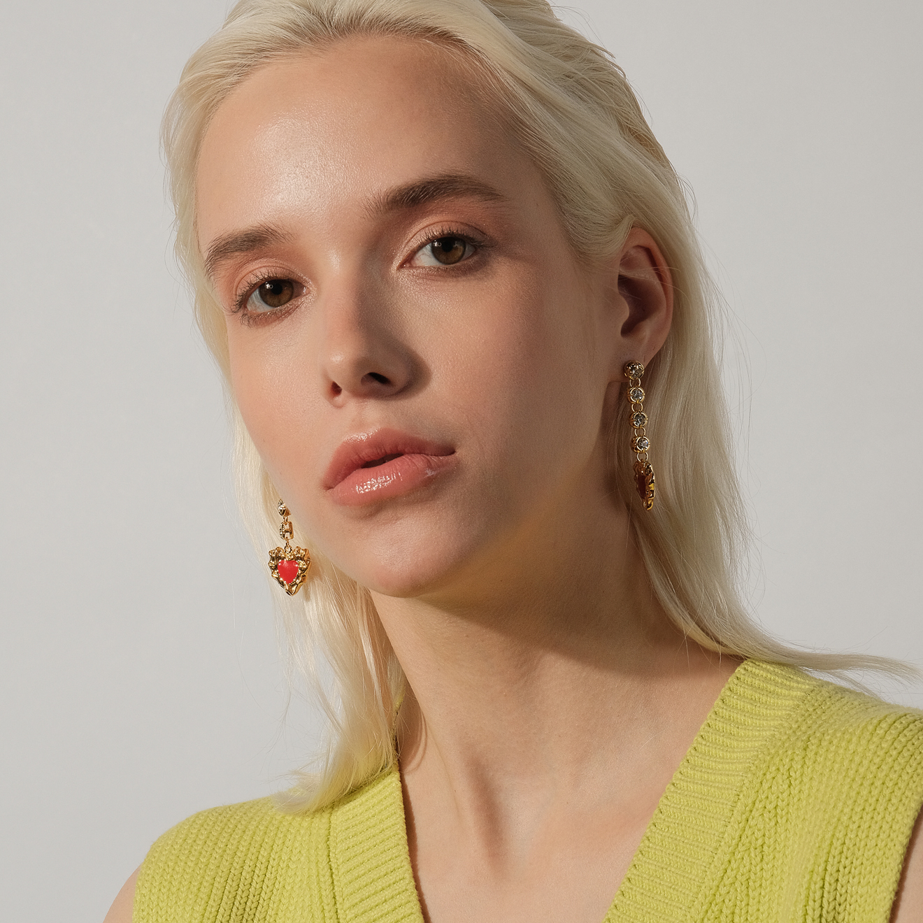 earrings with a red heart