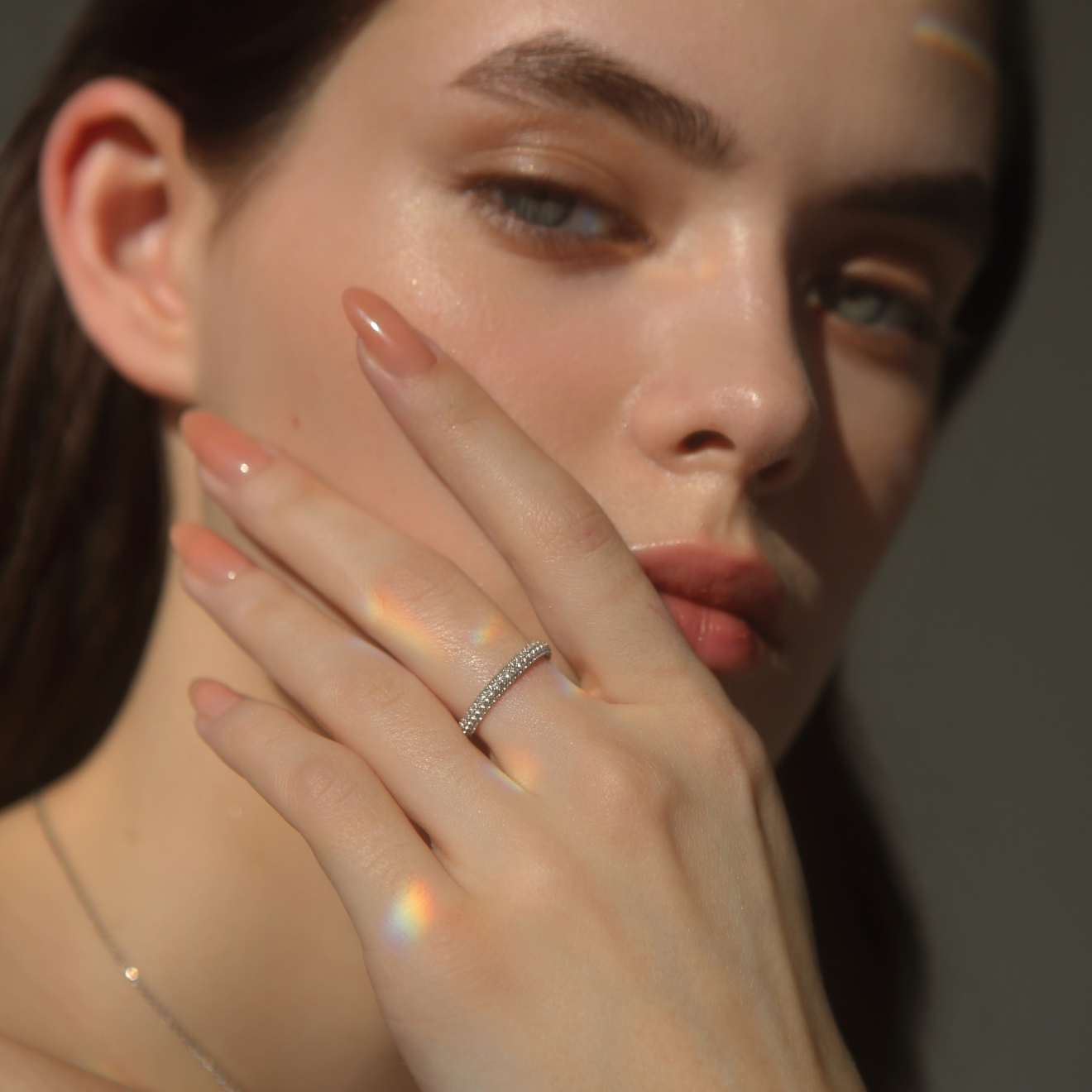 Silver ring with a scattering of white topaz