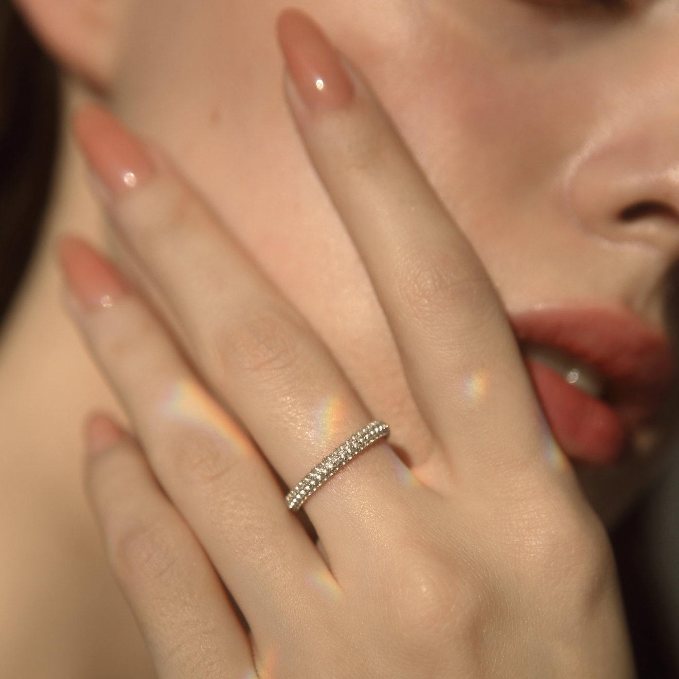 Silver ring with a scattering of white topaz