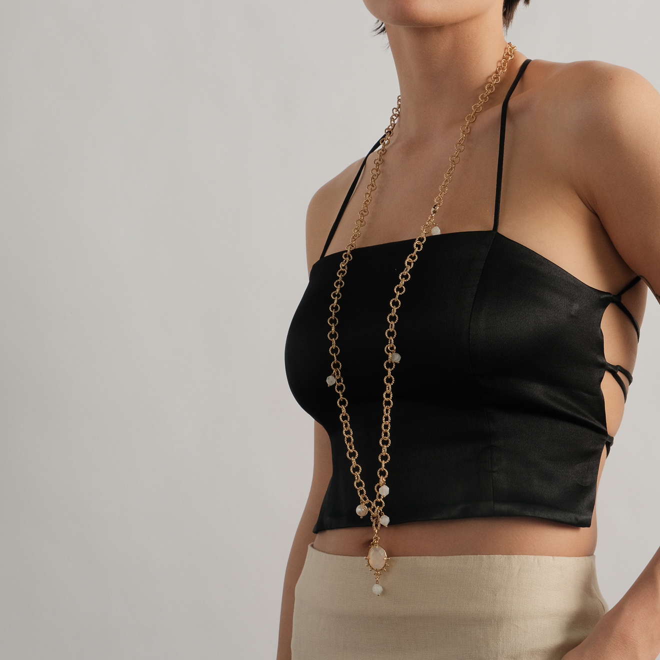 gold-plated chain necklace with pearls and moonstone