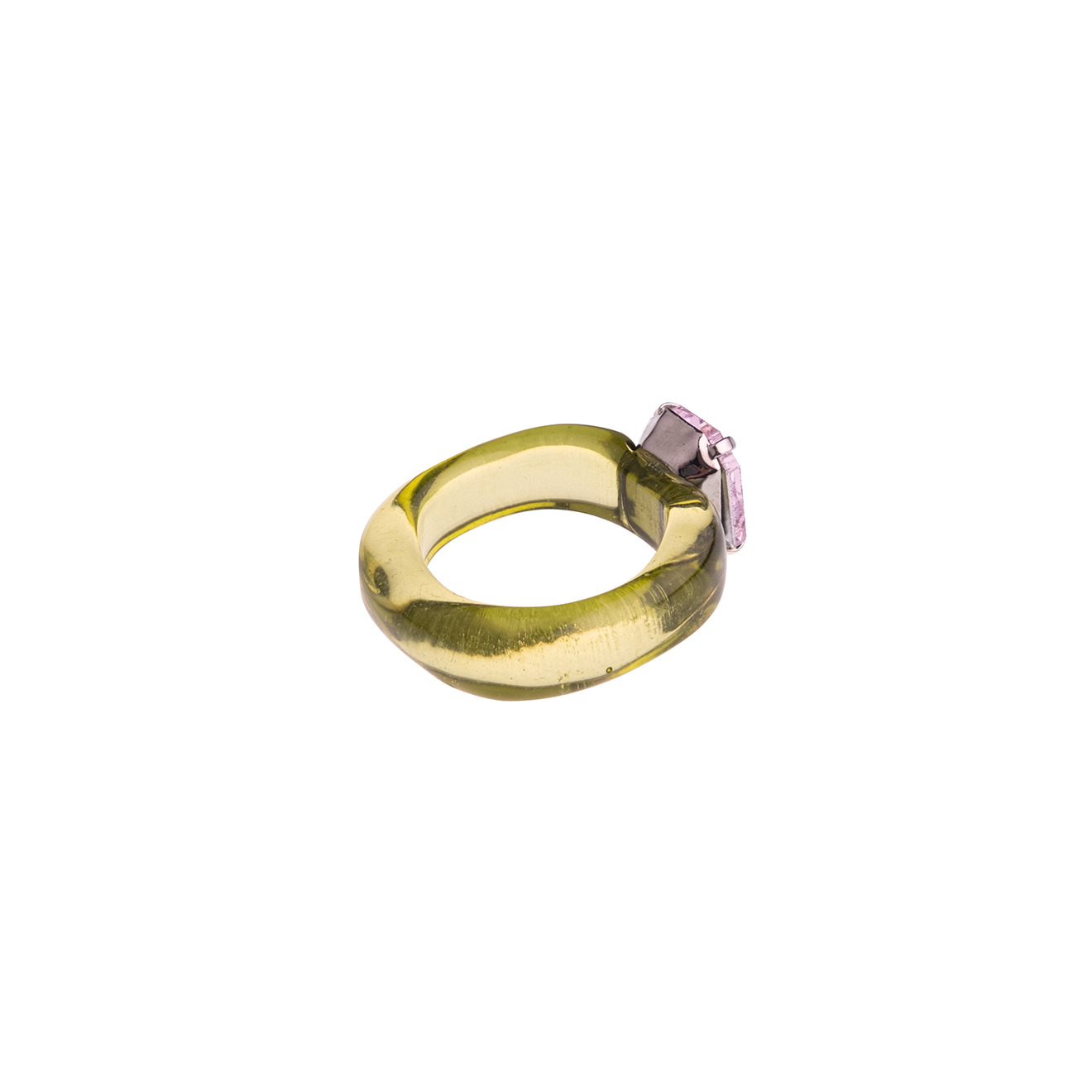 Ring made of light green plastic with a purple stone