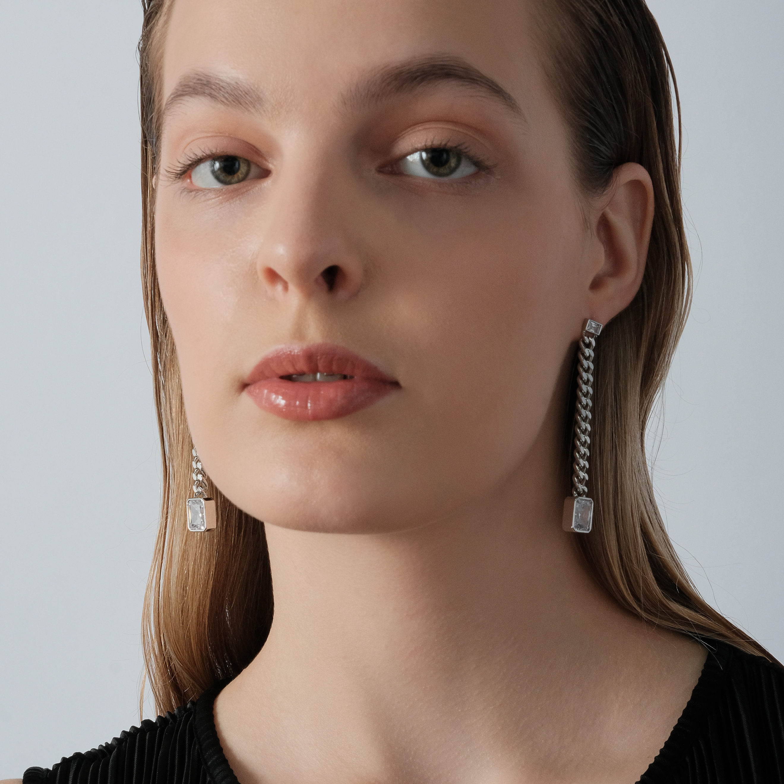 earrings with chains and large crystals